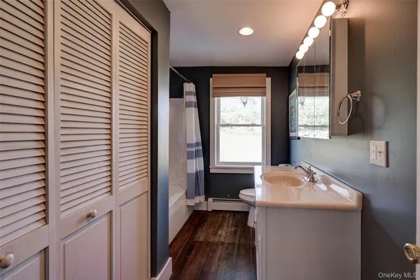 a view of a porch with wooden floor and outdoor space