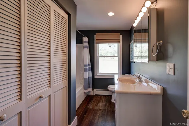 a view of a porch with wooden floor and outdoor space