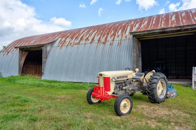 a view of a golf course with an ocean