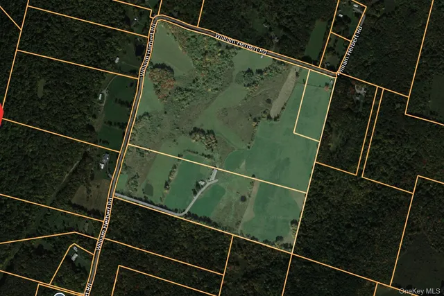 a close up of a lamp with paintings on the wall