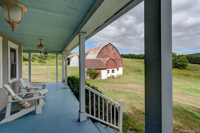 a view of a porch with furniture