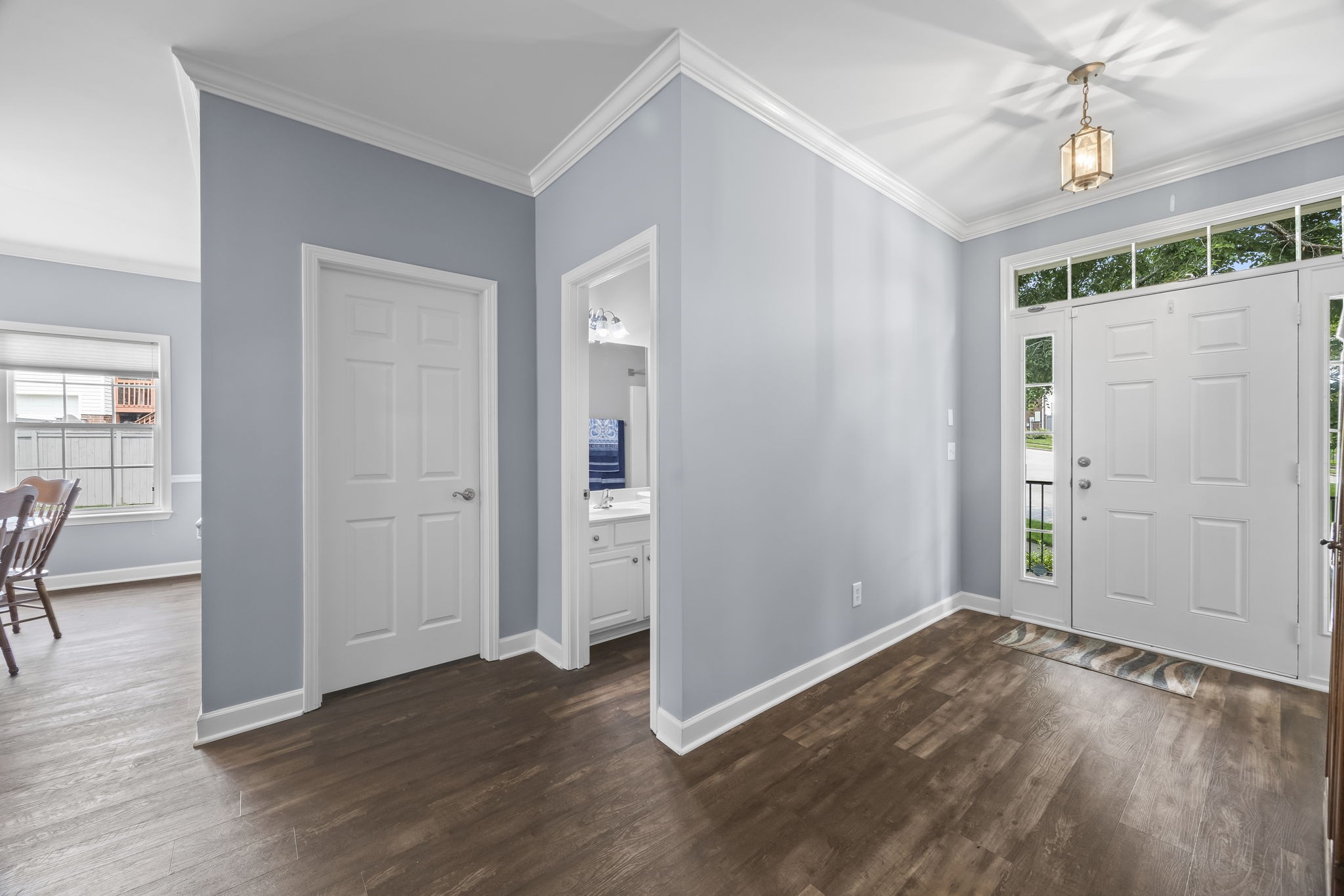 1305 Decatur Circle Franklin, TN 37067 - Photo 12 of 29 an empty room with wooden floor and windows