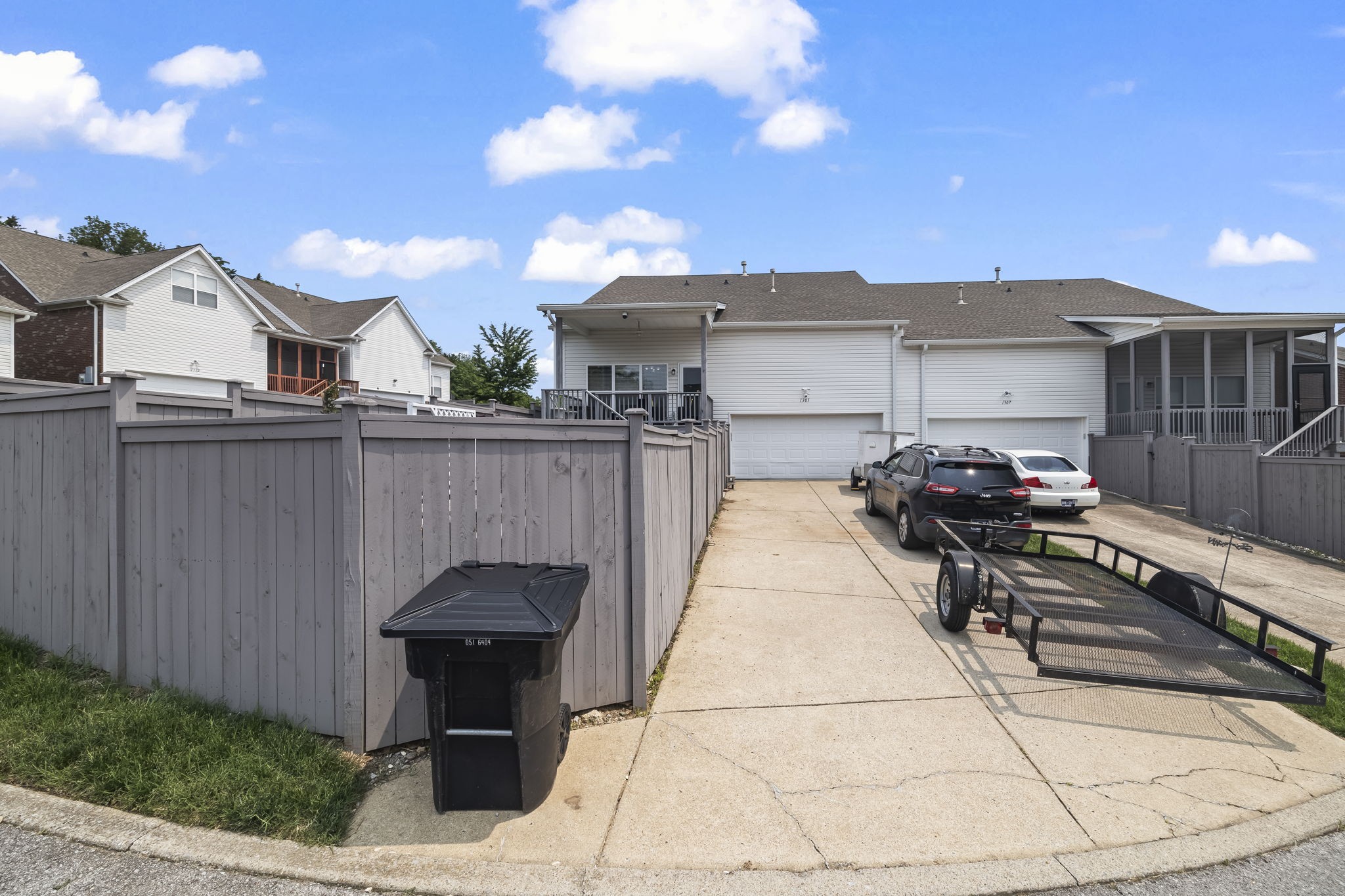 1305 Decatur Circle Franklin, TN 37067 - Photo 28 of 29 a view of a patio with table and chairs with wooden fence