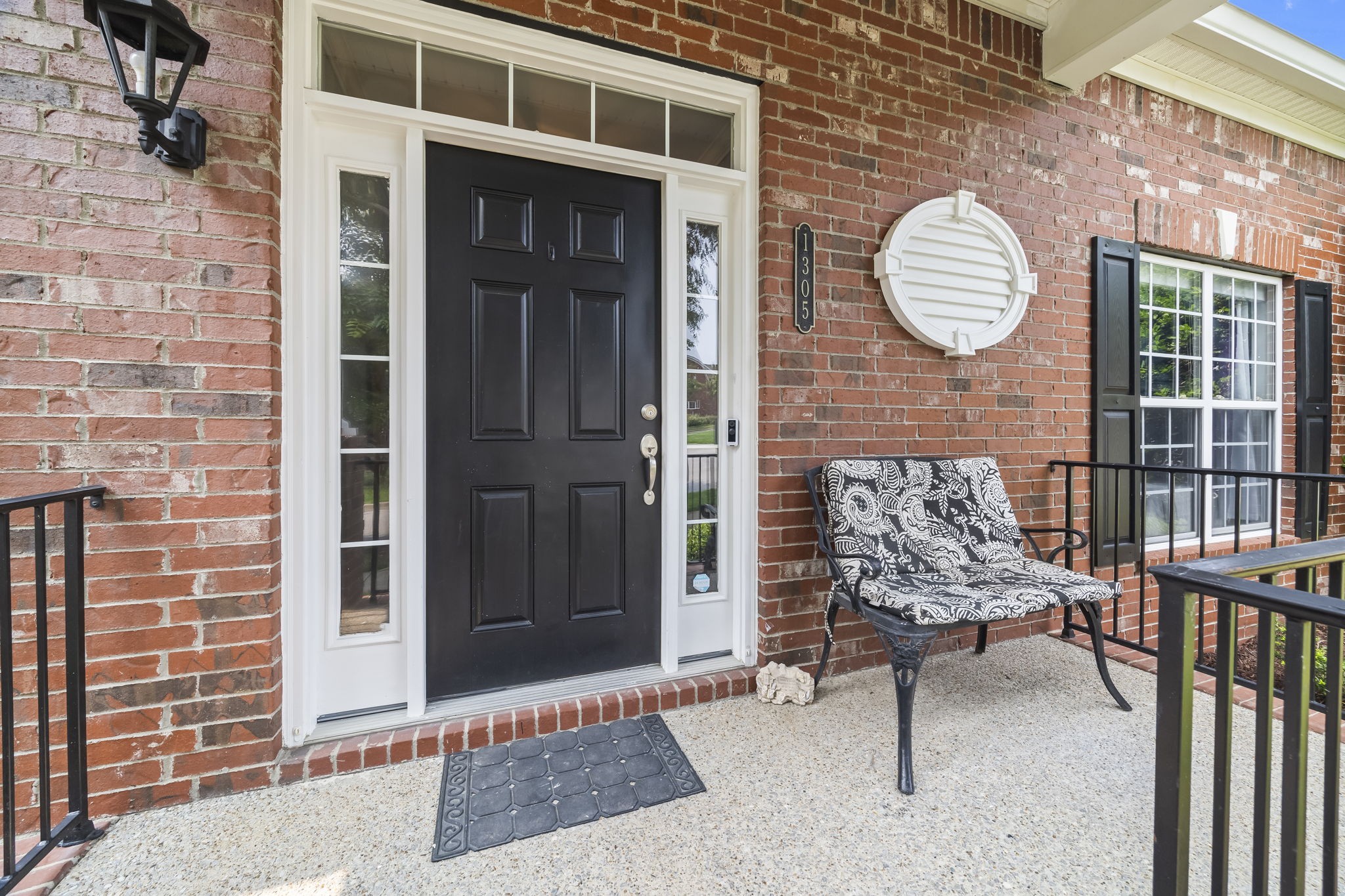 1305 Decatur Circle Franklin, TN 37067 - Photo 4 of 29 a view of a porch with a table and chair