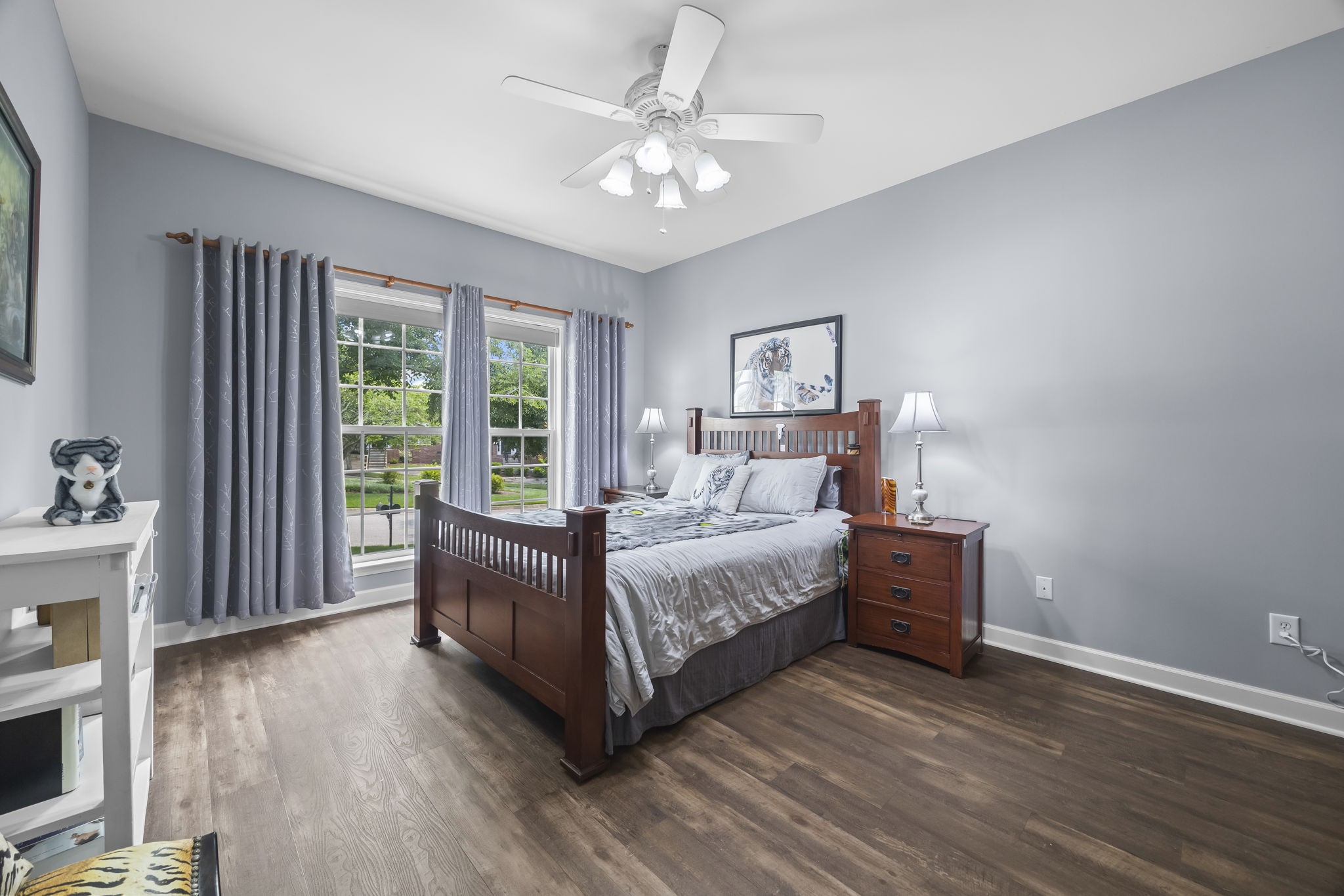 1305 Decatur Circle Franklin, TN 37067 - Photo 6 of 29 a bedroom with a large bed and a chandelier