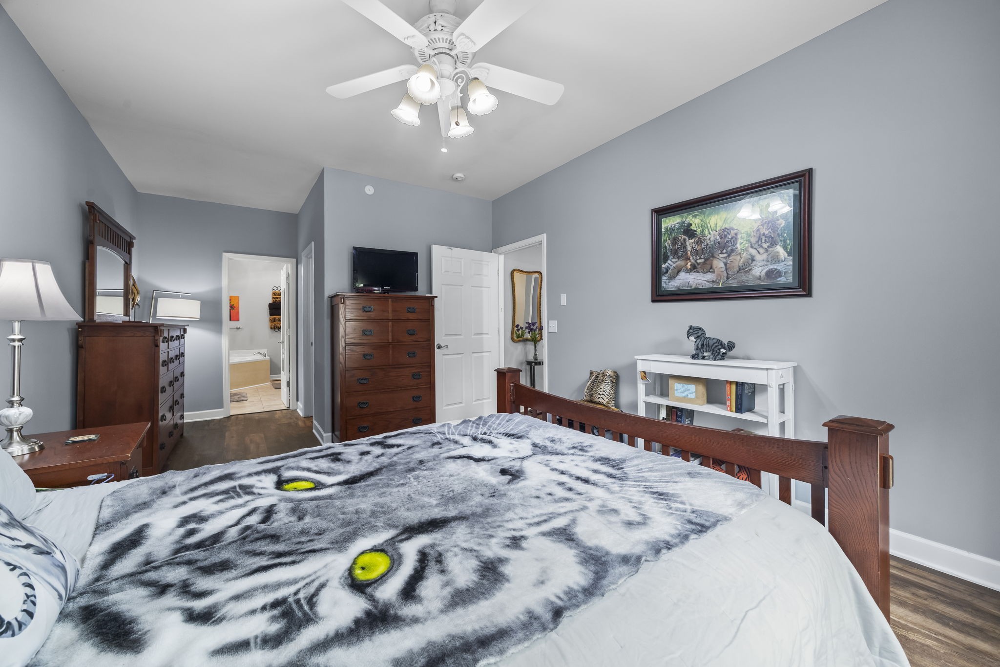 1305 Decatur Circle Franklin, TN 37067 - Photo 7 of 29 a bedroom with a bed and a flat screen tv