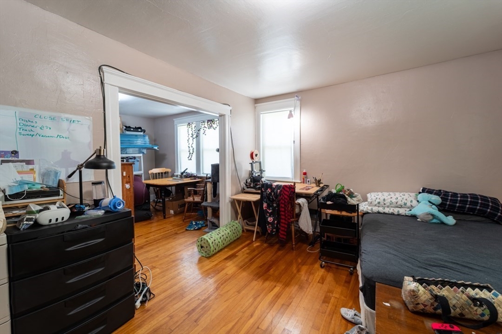 8 Lamar Avenue Worcester, MA 01604 - Photo 24 of 26 a living room with furniture and wooden floor