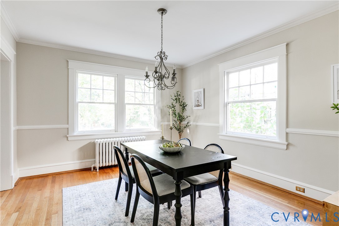 4808 Stuart Avenue Richmond, VA 23226 - Photo 11 of 41 a dining room with furniture window and wooden floor