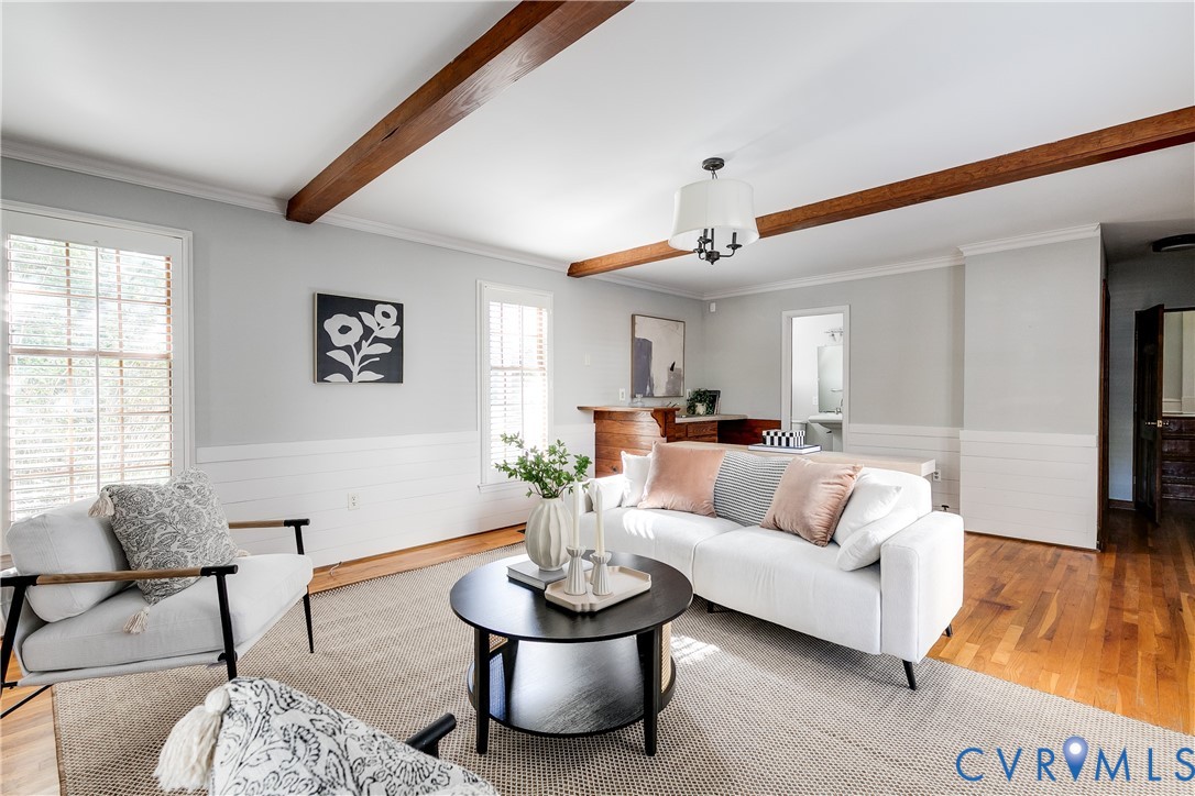 4808 Stuart Avenue Richmond, VA 23226 - Photo 20 of 41 a living room with furniture and a potted plant