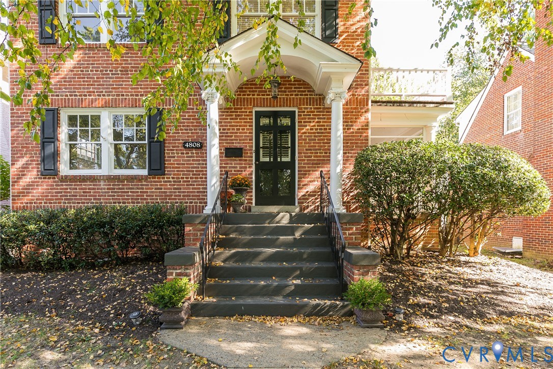 4808 Stuart Avenue Richmond, VA 23226 - Photo 2 of 41 a front view of a house with a garden