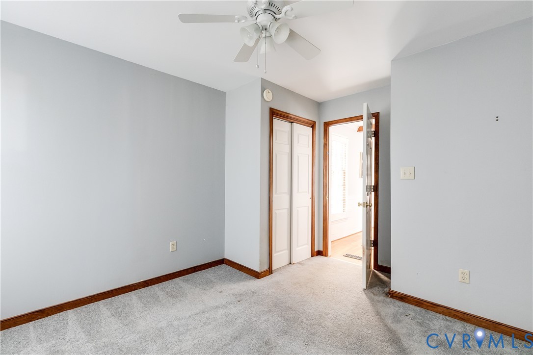 4808 Stuart Avenue Richmond, VA 23226 - Photo 24 of 41 a view of a room with a ceiling fan and a window