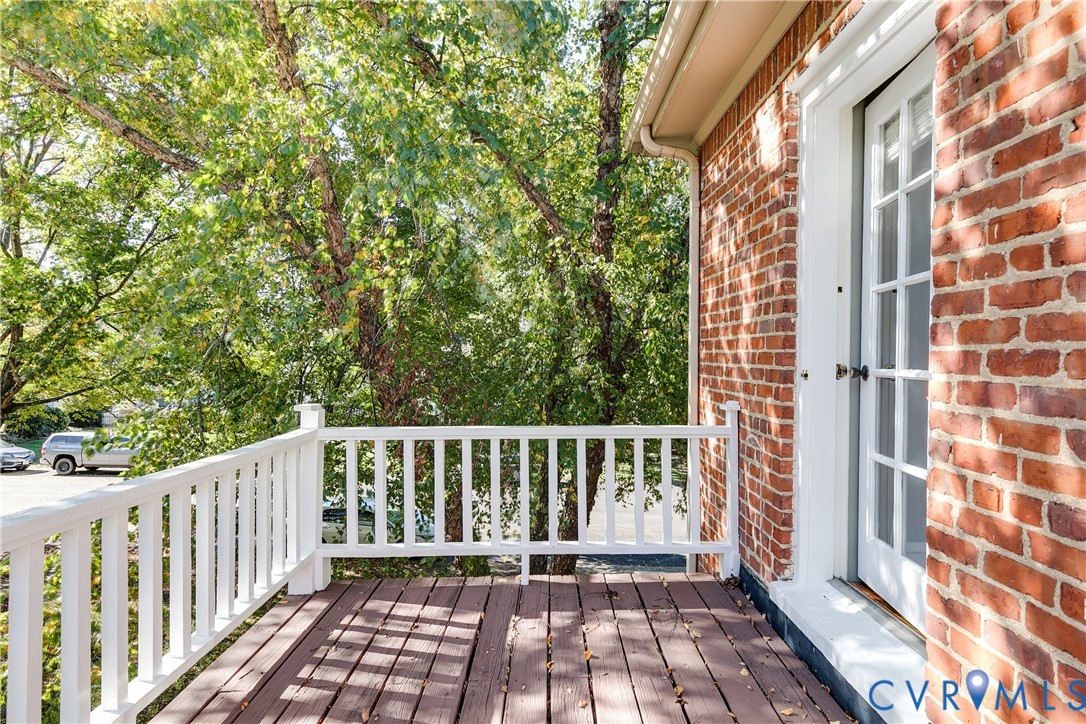 4808 Stuart Avenue Richmond, VA 23226 - Photo 32 of 41 a view of a balcony with wooden floor