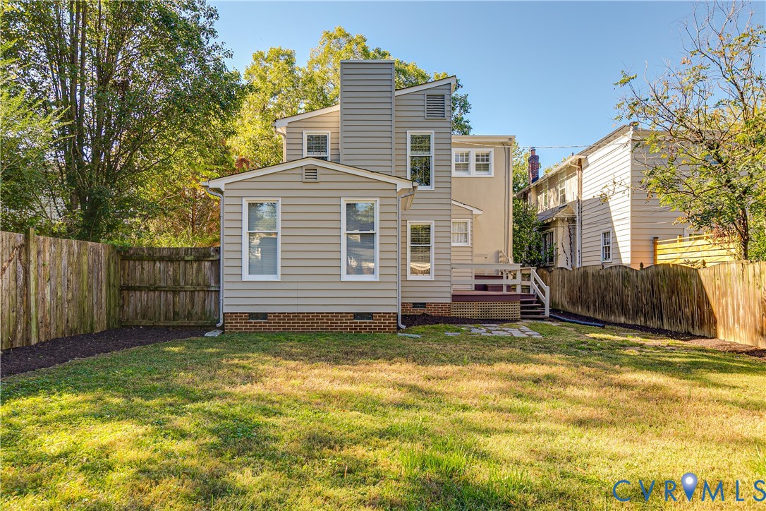 4808 Stuart Avenue Richmond, VA 23226 - Photo 40 of 41 a view of a house with a yard and deck