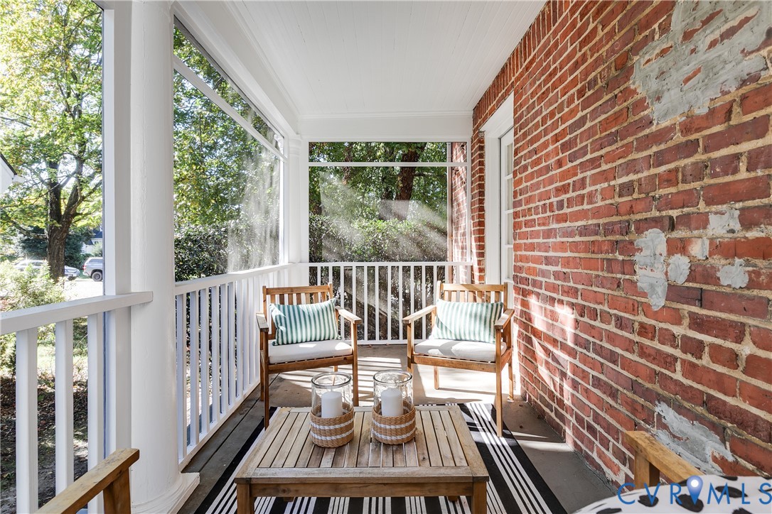 4808 Stuart Avenue Richmond, VA 23226 - Photo 9 of 41 a view of a balcony with wooden floor