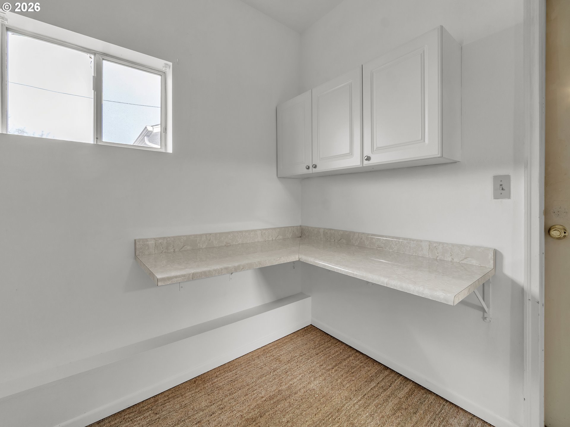 1749 Thompson Road Woodburn, OR 97071 - Photo 25 of 33 a view of an empty room with a window