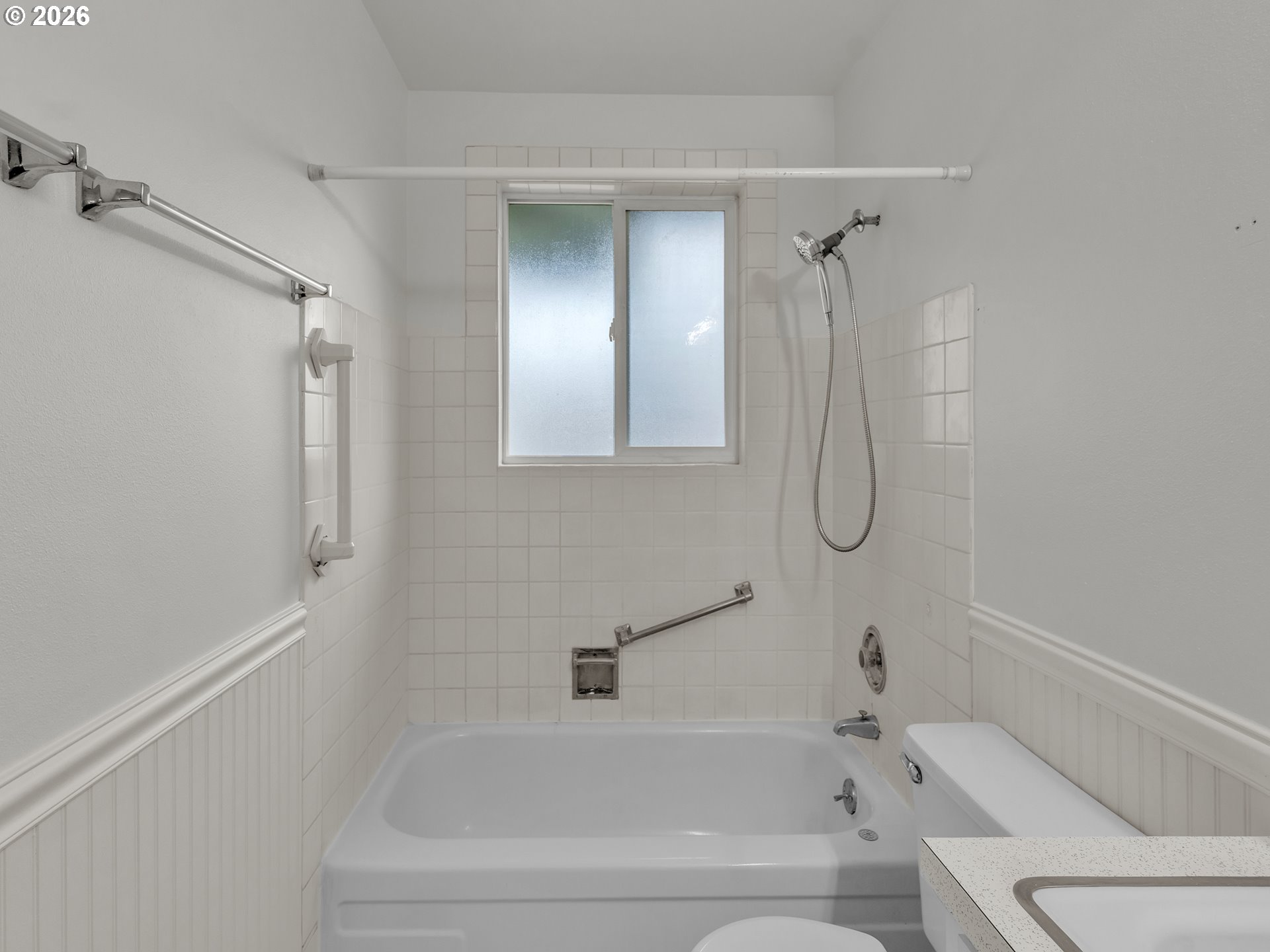 1749 Thompson Road Woodburn, OR 97071 - Photo 28 of 33 a white bath tub sitting next to a shower