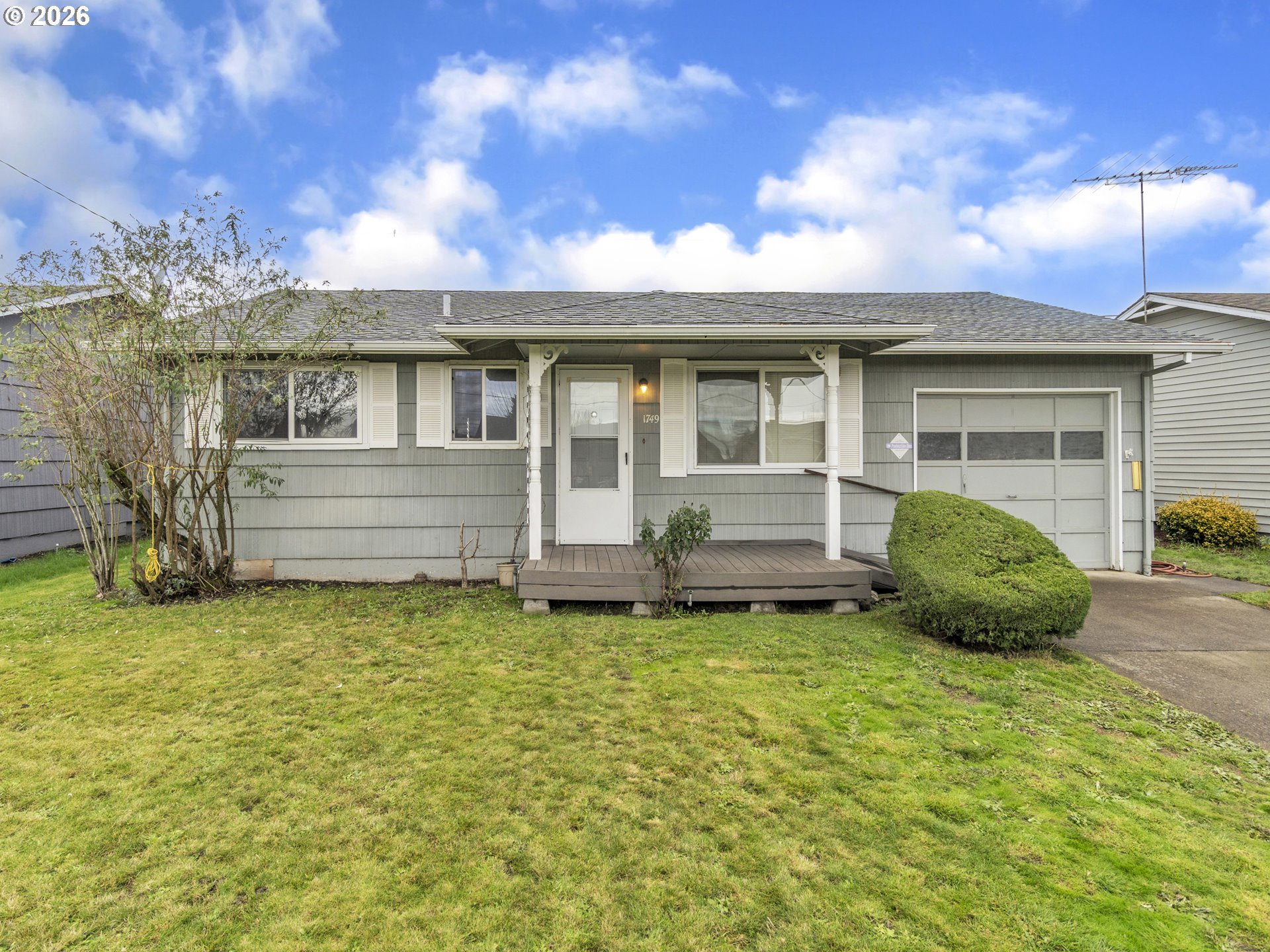 1749 Thompson Road Woodburn, OR 97071 - Photo 4 of 33 a view of a house with a garden