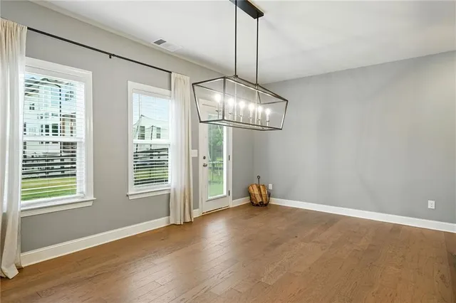 a view of storage and utility room with racks on the wall
