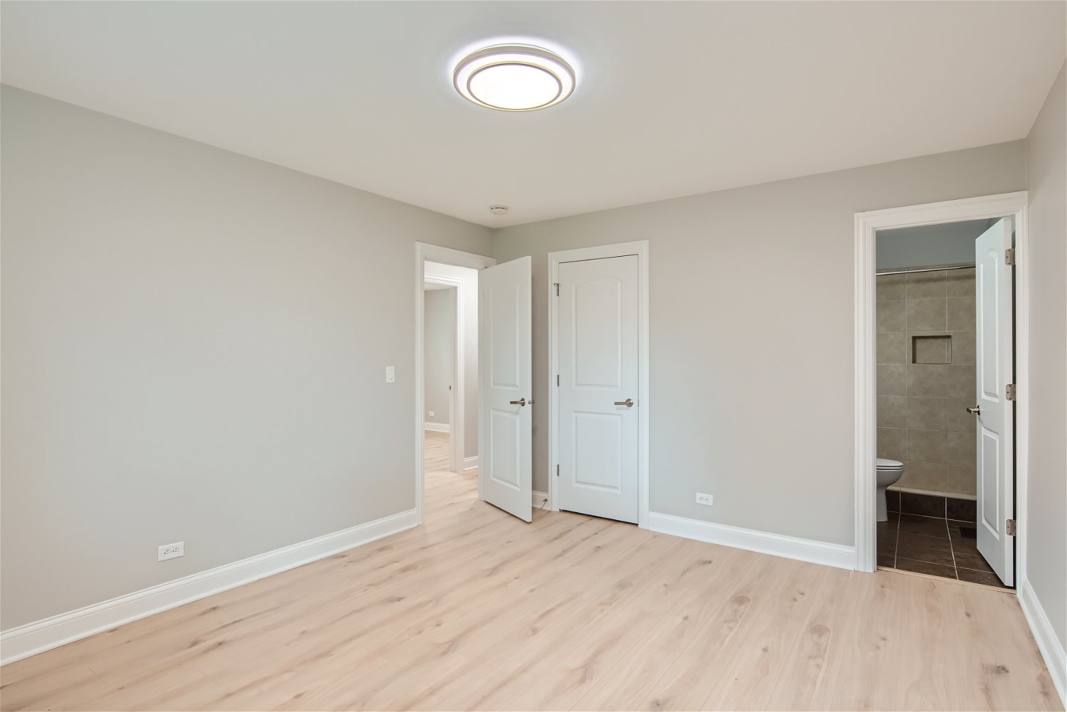 1460 7 Pines Road, Unit A1 Schaumburg, IL 60193 - Photo 6 of 11 a view of room with window and hardwood floor