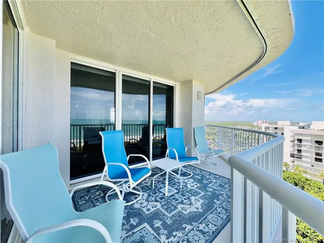 a view of a swimming pool and a yard