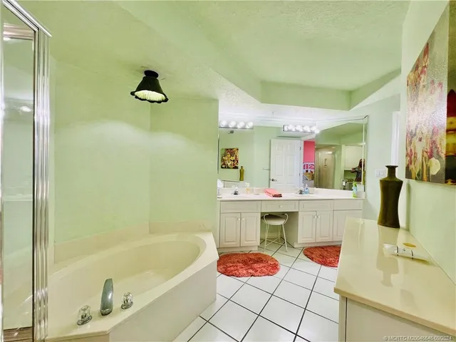 a view of a balcony with wooden floor