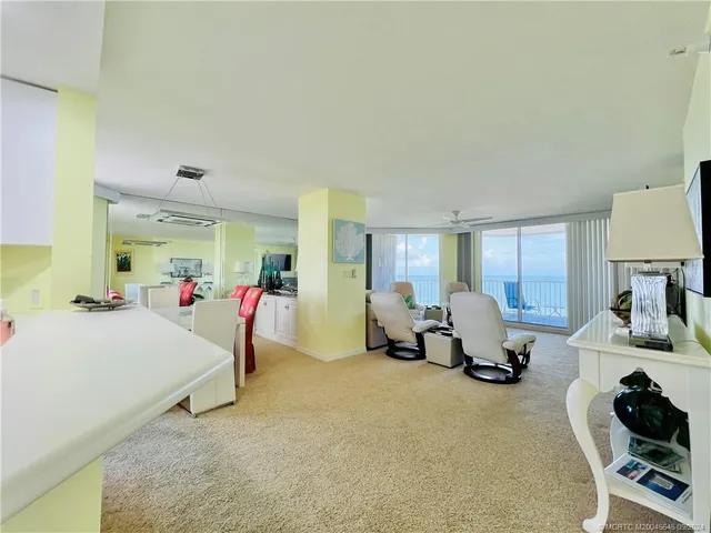a kitchen with a sink cabinets and window