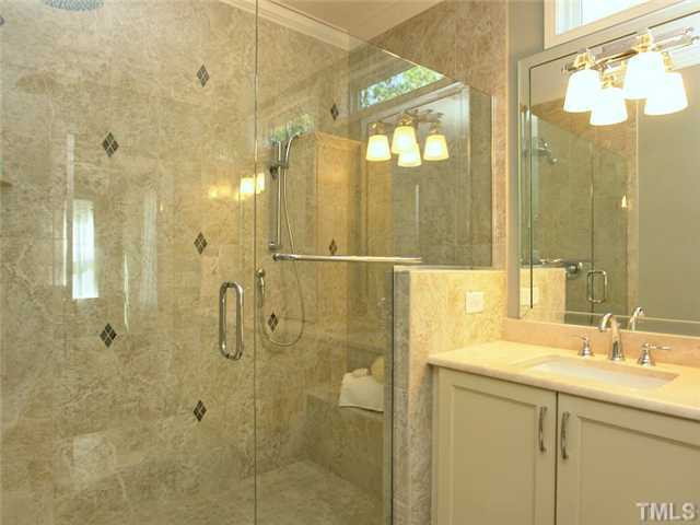 2304 Finley Ridge Lane Raleigh, NC 27615 - Photo 9 of 24 Master Bath Design Showing Cream On Cream Color Scheme For The Cabinets And Marble. Master Bath/Spa