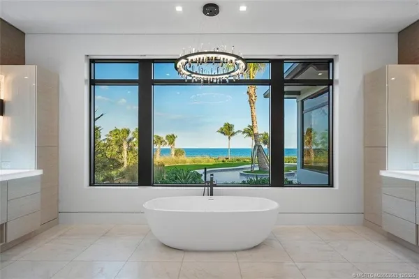 a utility room with sink dryer and washer