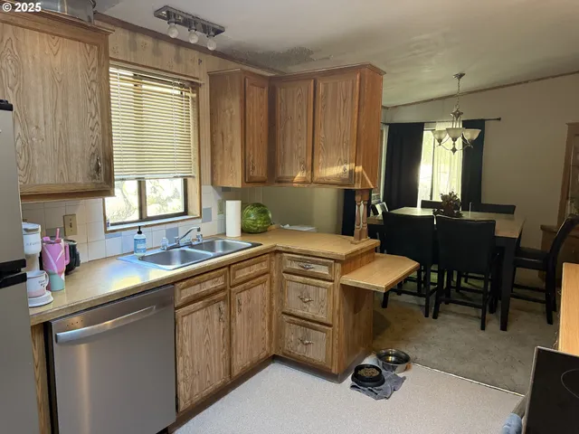 a view of a livingroom with furniture and window