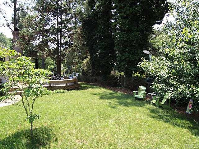 4701 Pemberton Drive Raleigh, NC 27609 - Photo 3 of 11 Large, PRIVATE, fully-fenced backyard is wonderful for spring and summer entertaining!