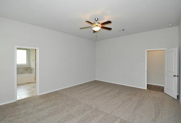 a kitchen with stainless steel appliances granite countertop a sink a stove and microwave
