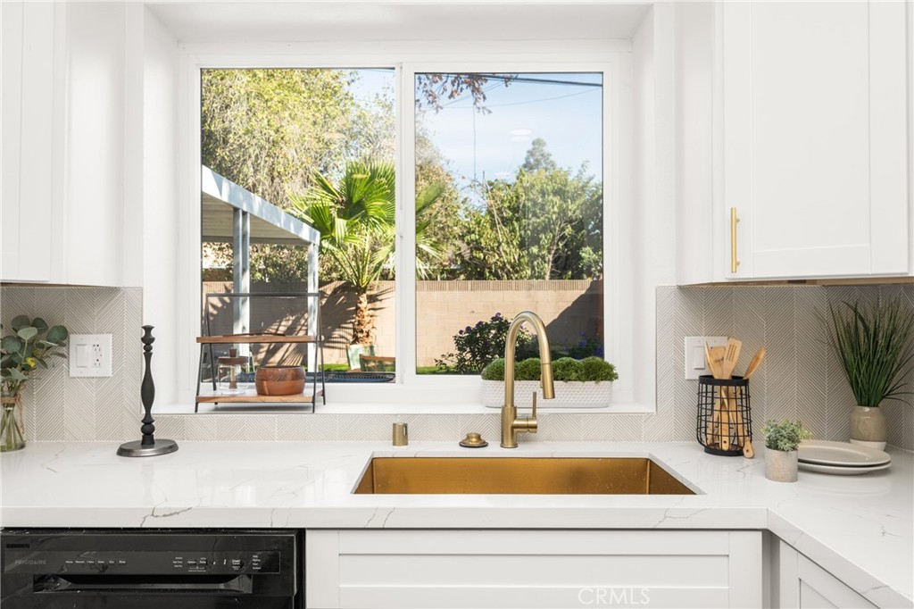 19212 Gunlock Avenue Carson, CA 90746 - Photo 19 of 56 a kitchen with a sink and a large window