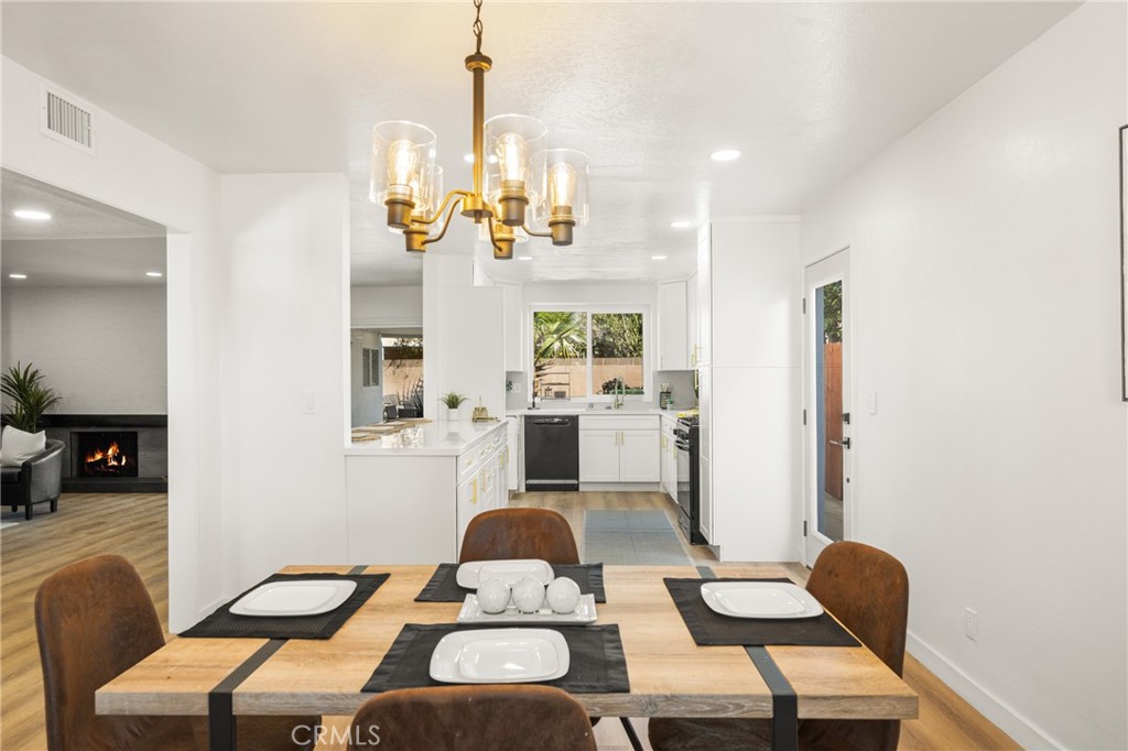 19212 Gunlock Avenue Carson, CA 90746 - Photo 24 of 56 a living room with furniture and wooden floor
