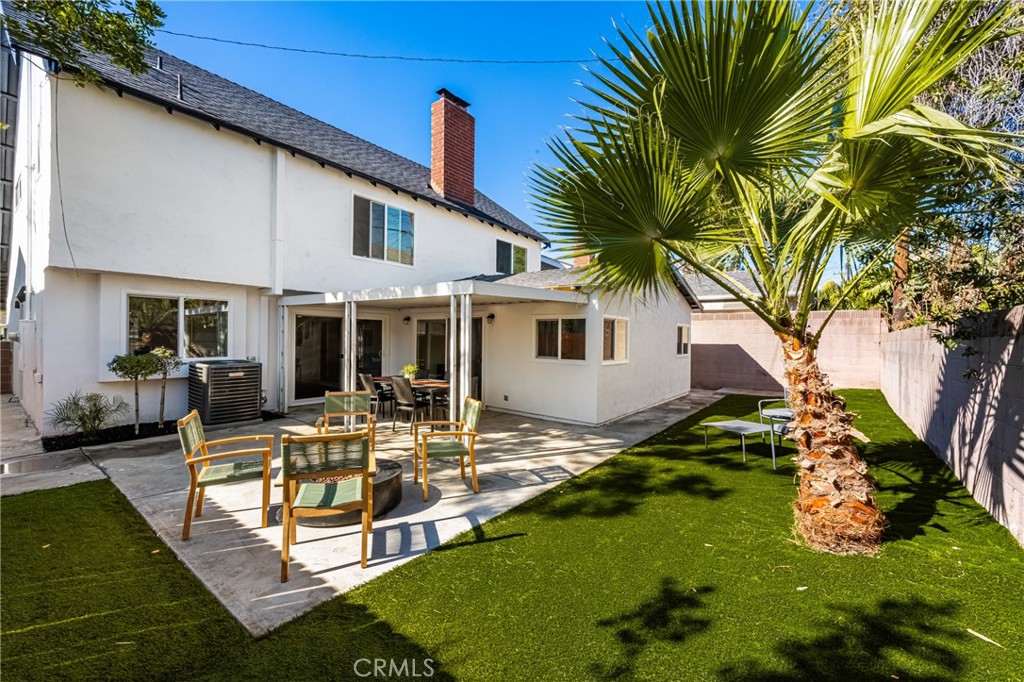 19212 Gunlock Avenue Carson, CA 90746 - Photo 28 of 56 a view of a house with backyard sitting area and swimming pool