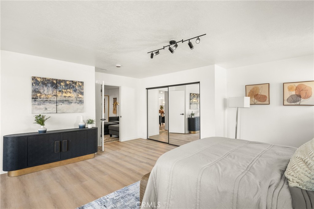 19212 Gunlock Avenue Carson, CA 90746 - Photo 32 of 56 a bedroom with a bed and dresser