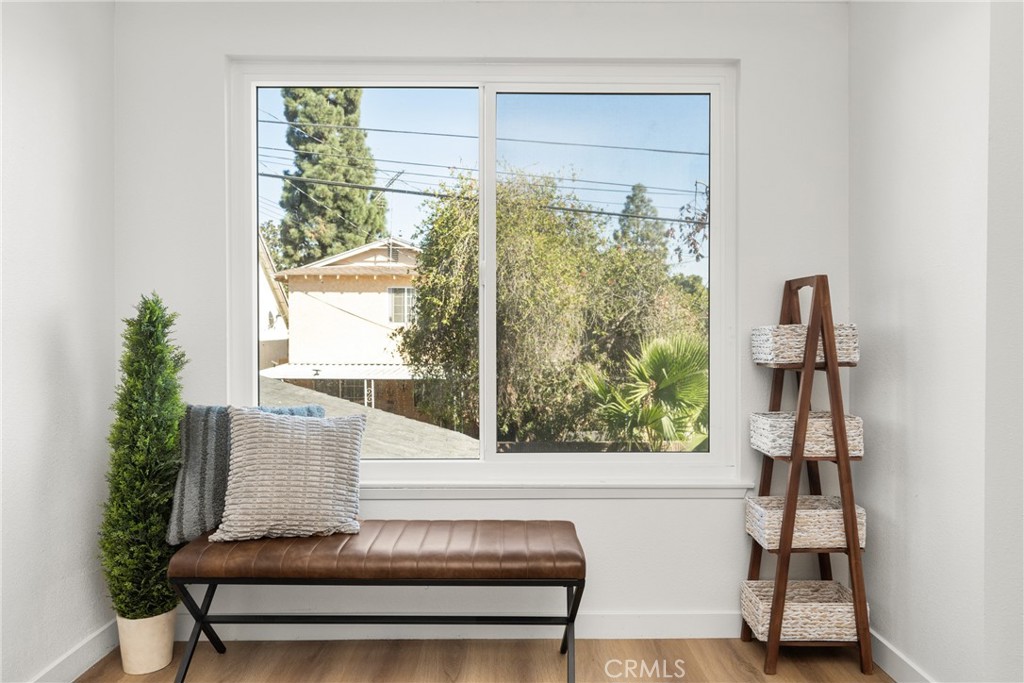 19212 Gunlock Avenue Carson, CA 90746 - Photo 42 of 56 a bench sitting in front of a window