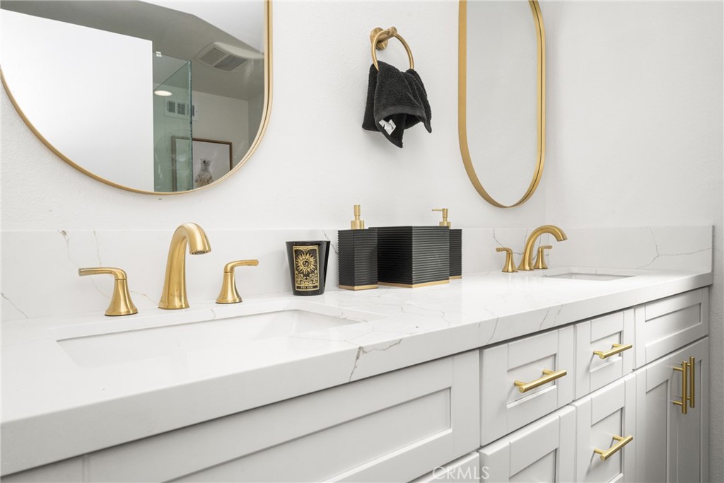 19212 Gunlock Avenue Carson, CA 90746 - Photo 45 of 56 a bathroom with a sink and a mirror