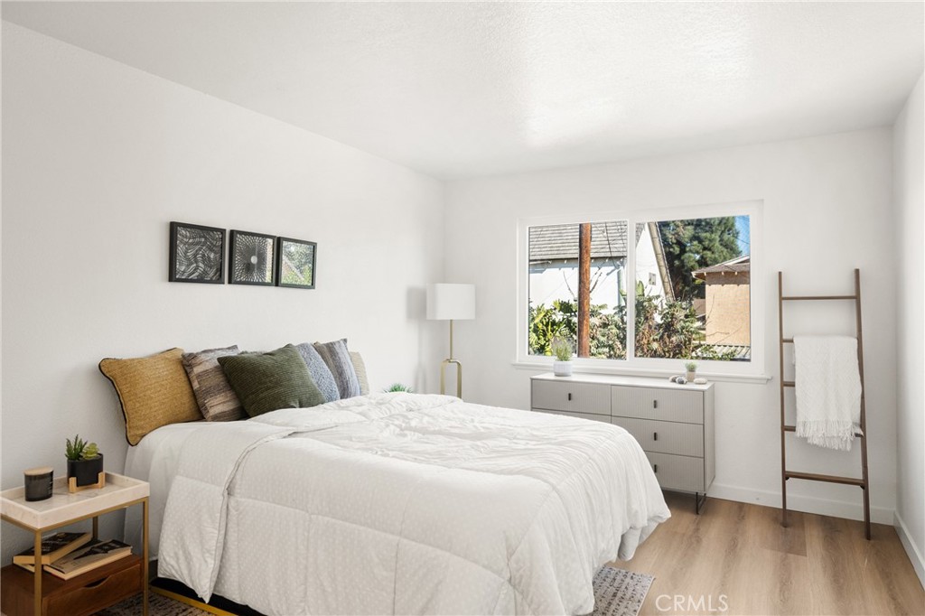 19212 Gunlock Avenue Carson, CA 90746 - Photo 48 of 56 a bedroom with a bed and a window