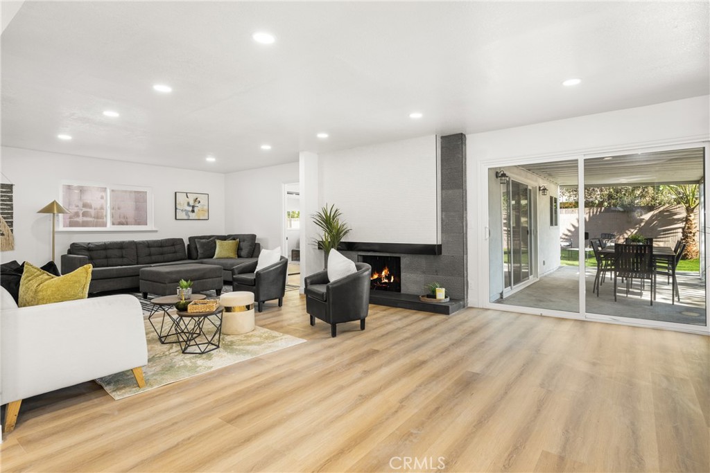 19212 Gunlock Avenue Carson, CA 90746 - Photo 5 of 56 a living room with furniture and a table