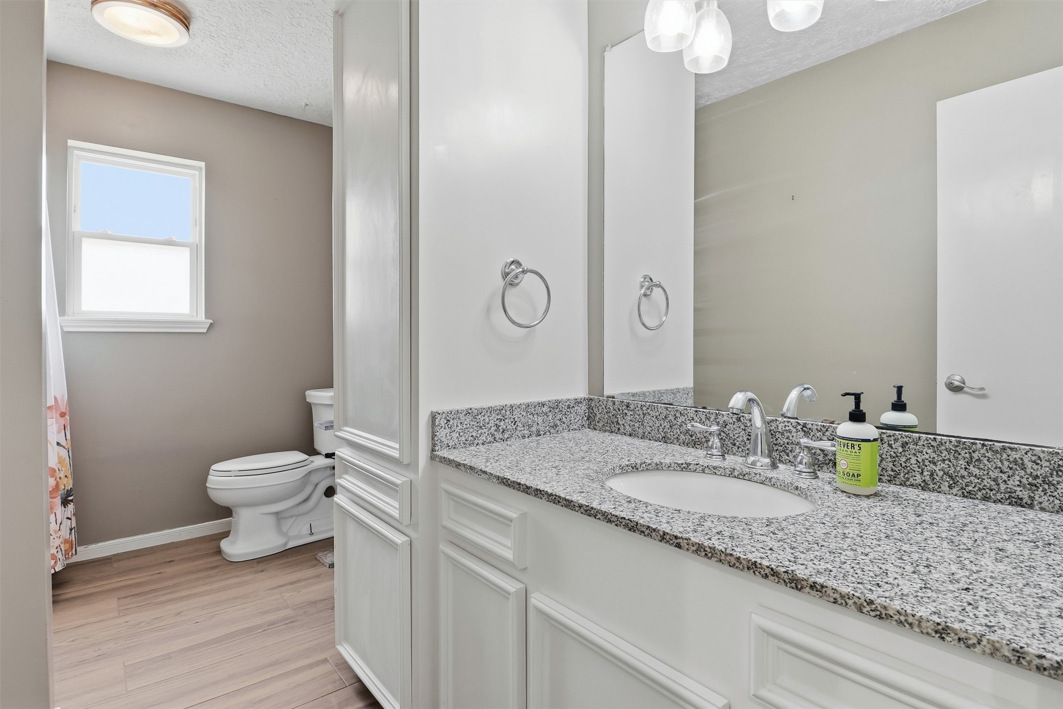 22923 Tomball Cemetery Road Tomball, TX 77377 - Photo 29 of 50 Updated bathroom vanity and new tile wood flooring!