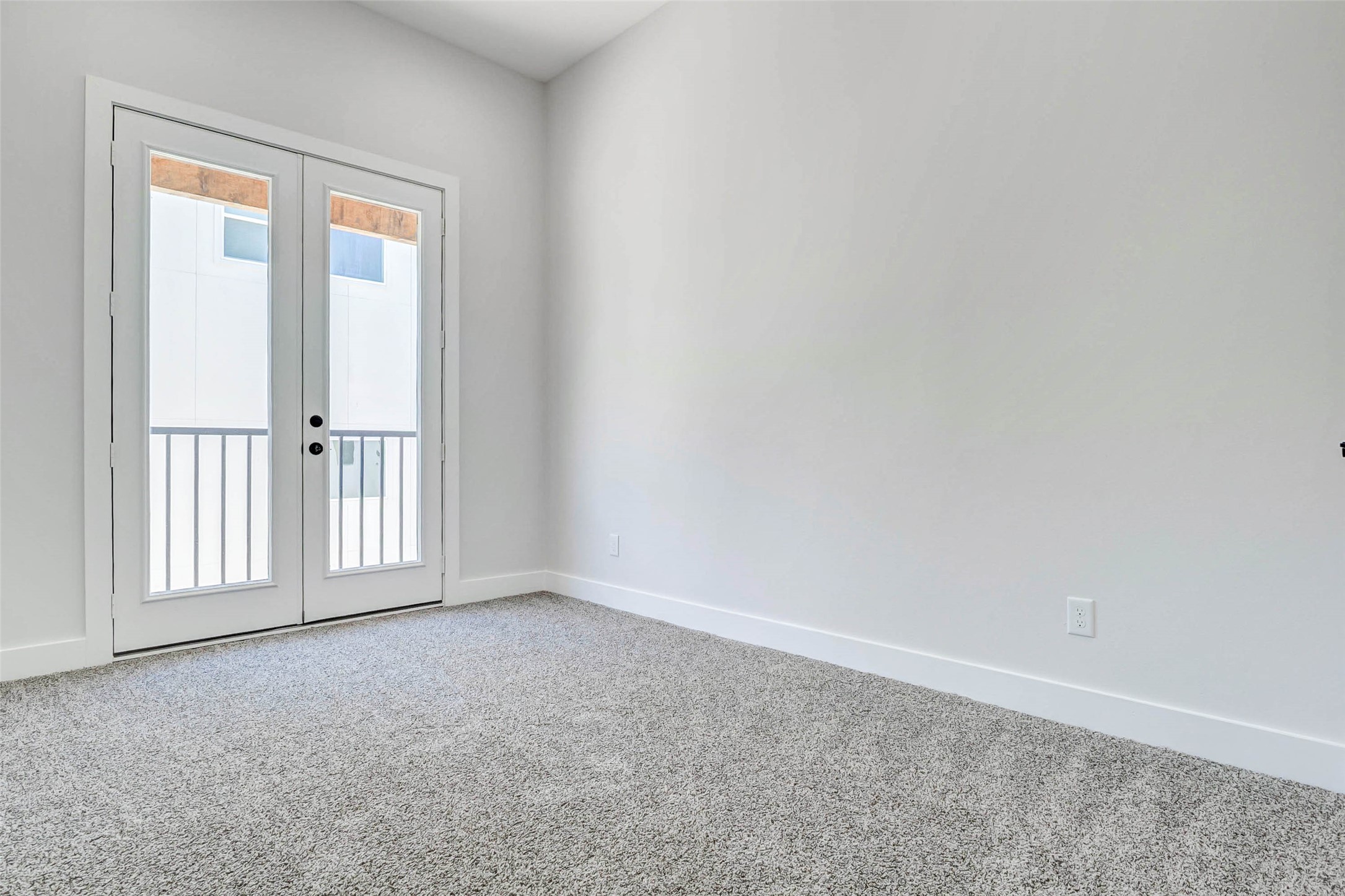 2310 Campbell Road, Unit C Houston, TX 77080 - Photo 15 of 27 an empty room with windows