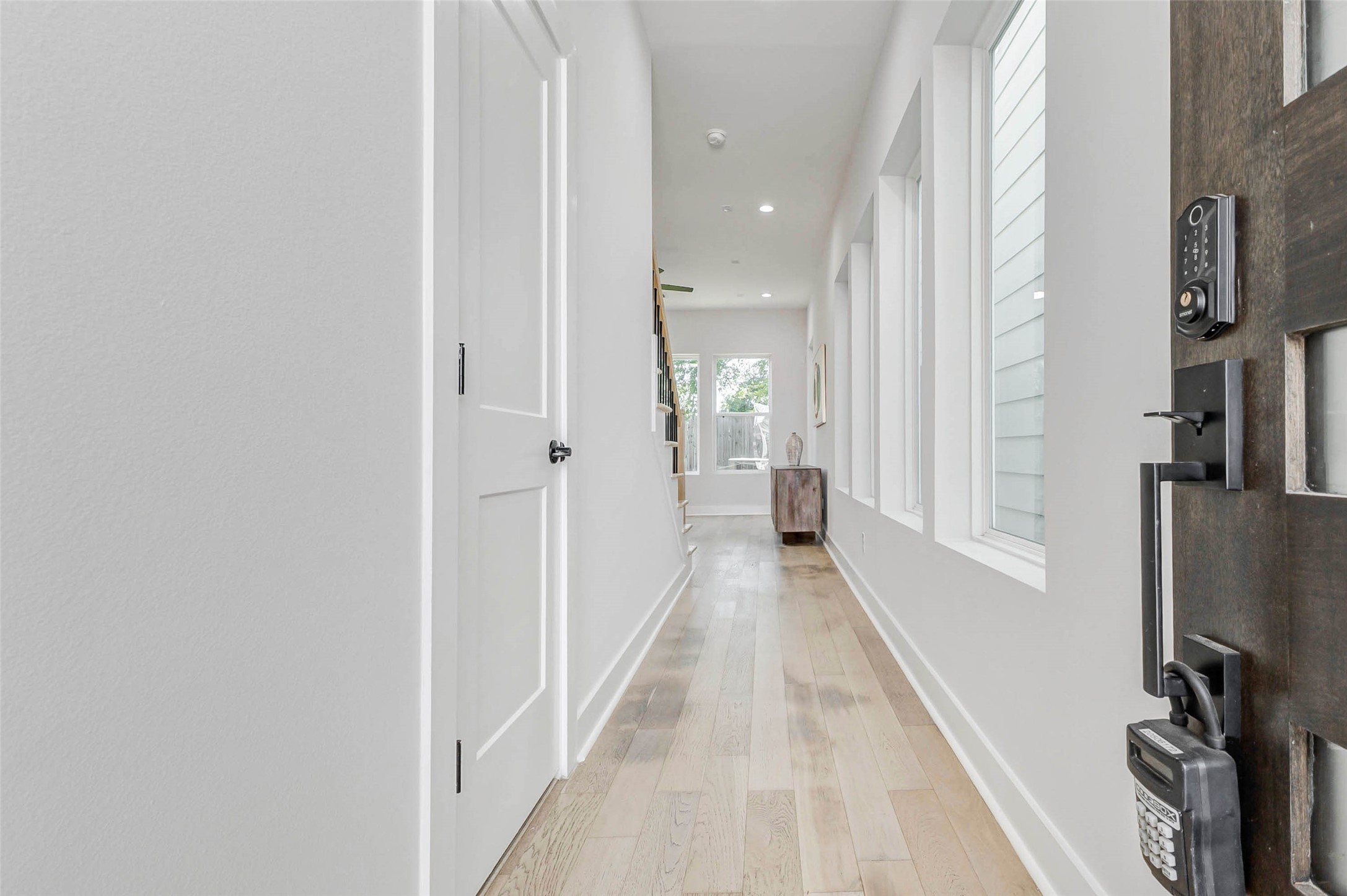 2310 Campbell Road, Unit C Houston, TX 77080 - Photo 2 of 27 a view of a hallway with a white walls