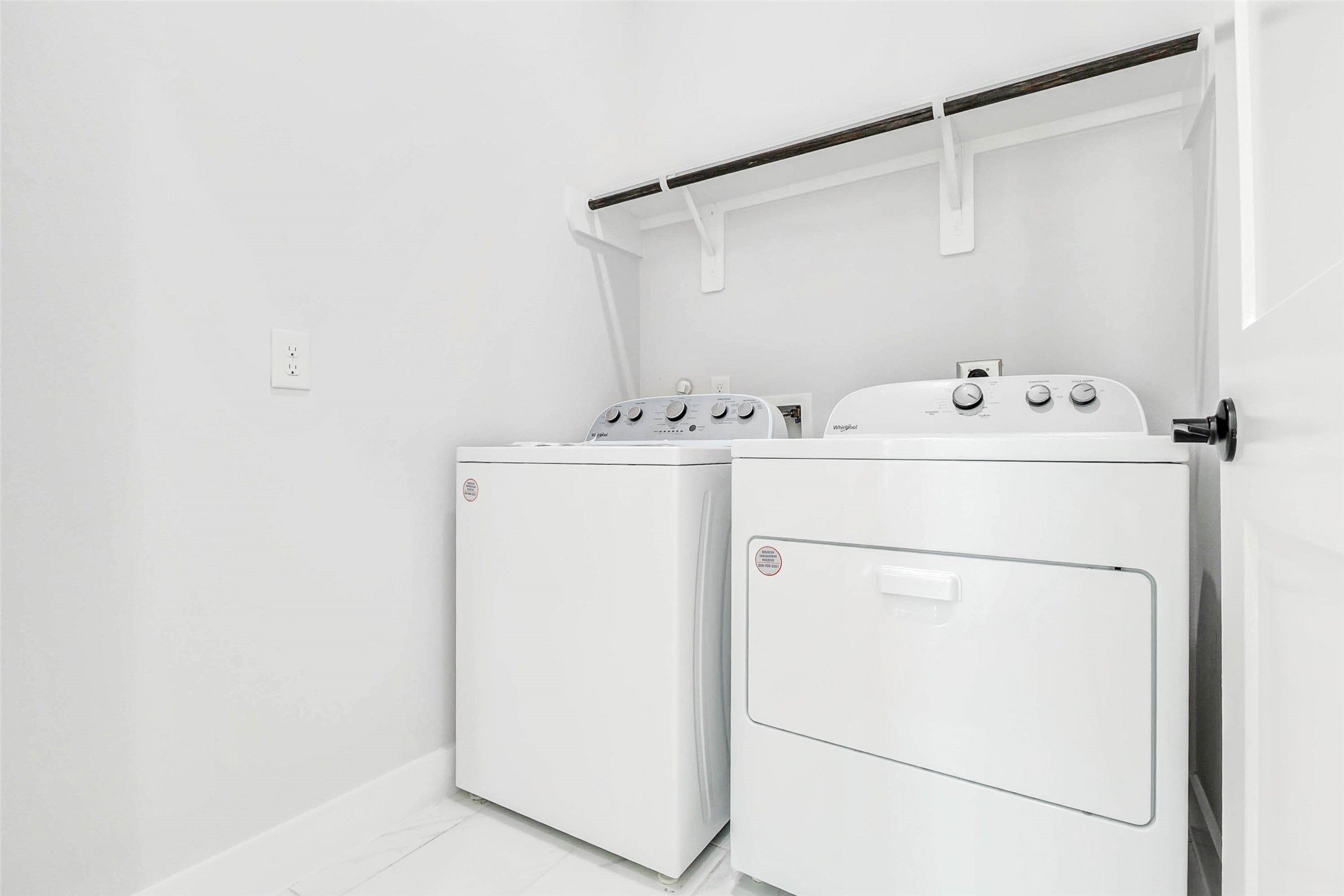 2310 Campbell Road, Unit C Houston, TX 77080 - Photo 21 of 27 a utility room with dryer and washer