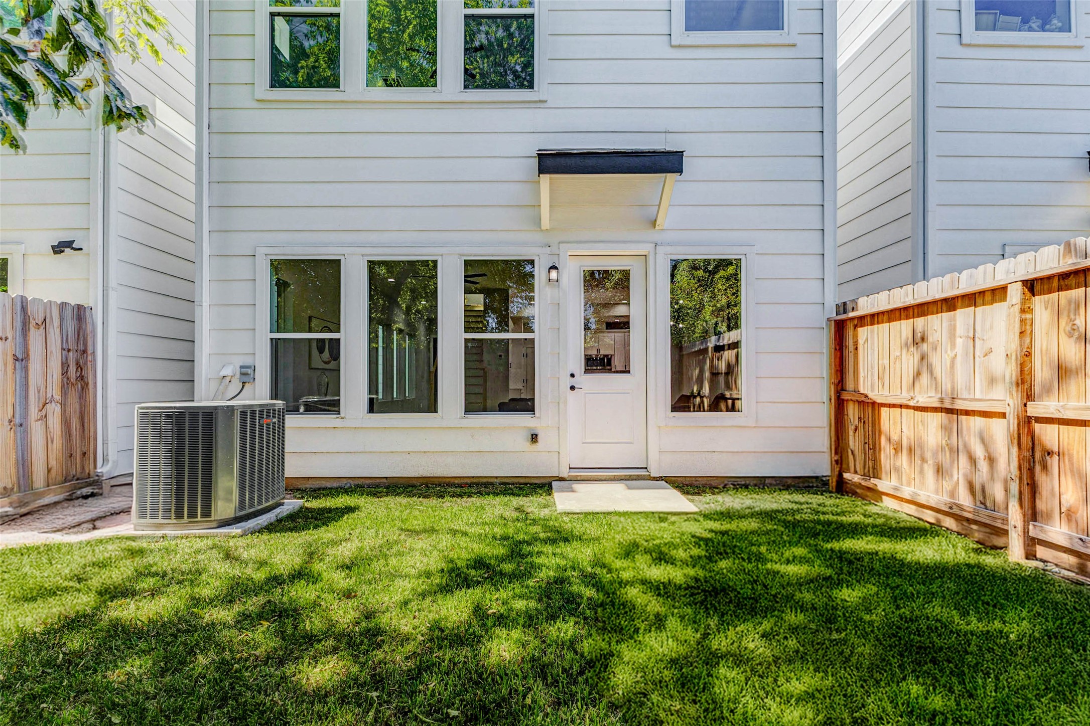 2310 Campbell Road, Unit C Houston, TX 77080 - Photo 23 of 27 a view of a backyard with a garden