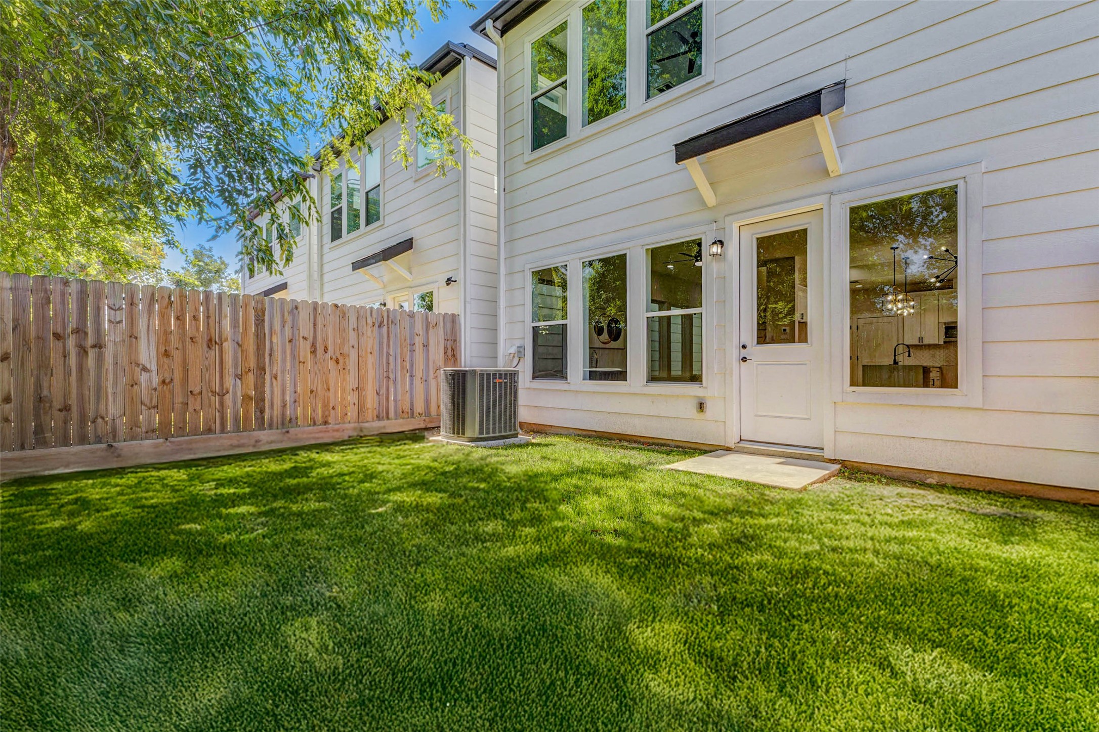 2310 Campbell Road, Unit C Houston, TX 77080 - Photo 24 of 27 front view of a house with a yard