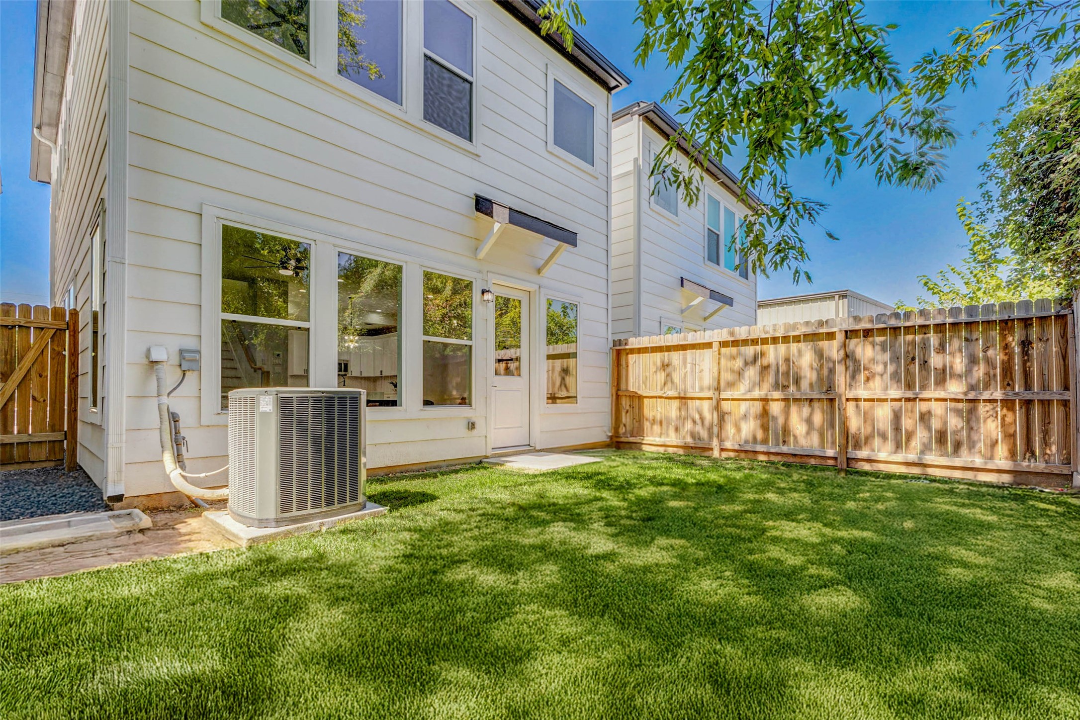 2310 Campbell Road, Unit C Houston, TX 77080 - Photo 25 of 27 a view of a house with backyard and a tree