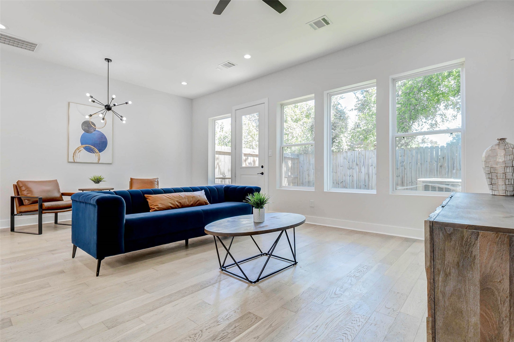 2310 Campbell Road, Unit C Houston, TX 77080 - Photo 4 of 27 a living room with furniture and a large window