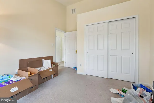 a bed room with furniture and a window