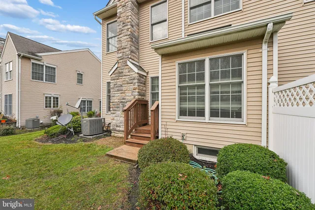 a backyard of a house with seating space
