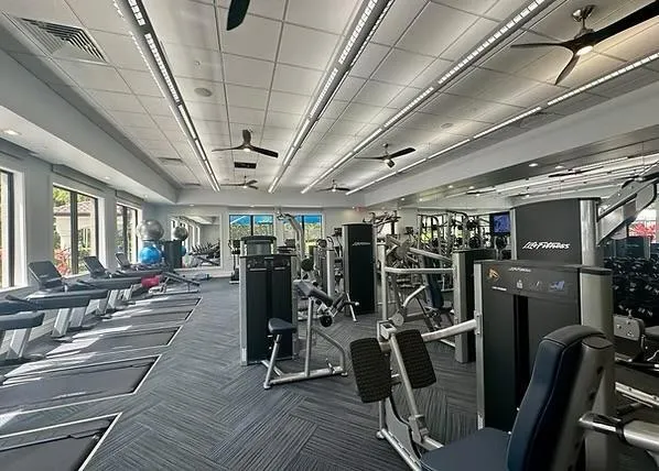 a view of a workspace with furniture